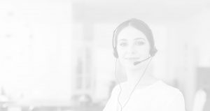 Customer support female employee wearing headphone and facing the camera, black and white
